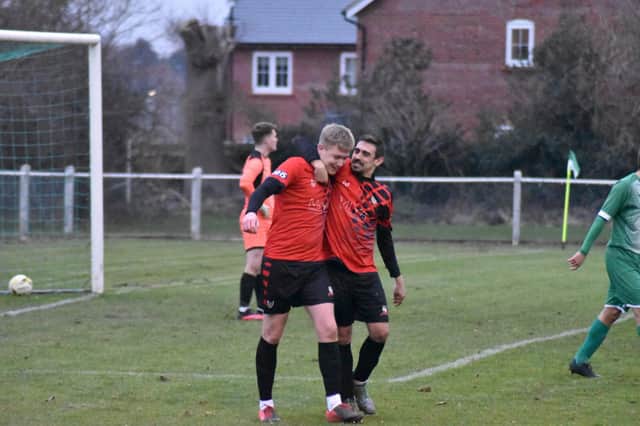Scorer Jake Baldwin is congratulated by Chris Stapleton