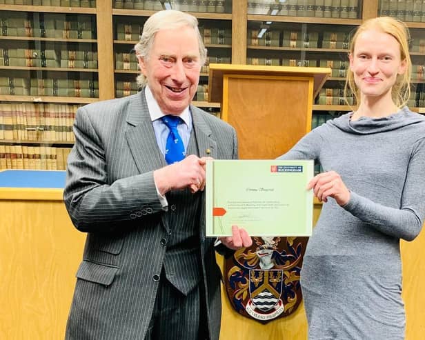 Sir Ivan presents the Rachel Lawrence Prize to law student Corinna Seagroatt.
