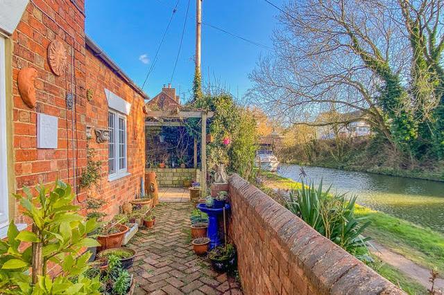 Stunning canal side cottage on the market for £350,000.