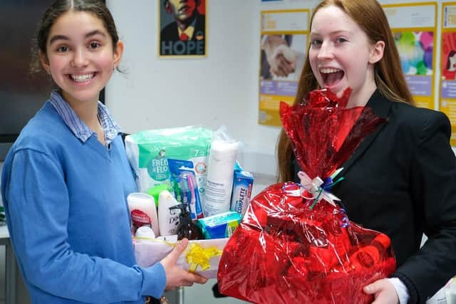 Students put together hampers of toiletries for the MK ACT women's refuge
