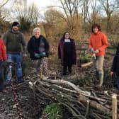 Volunteers with the finished structure