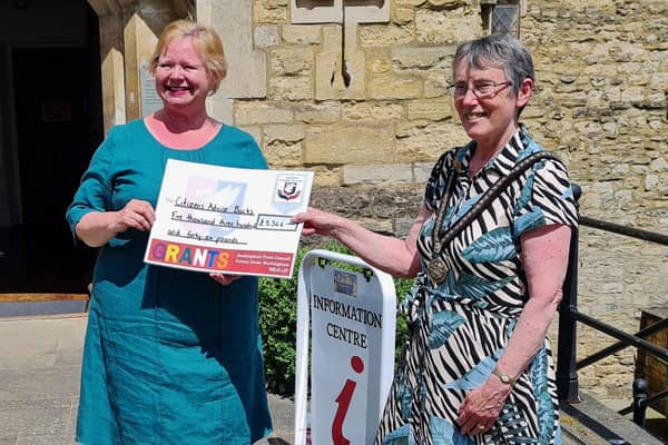 Jane Mordue, chair of Citizens Advice Bucks, receiving a grant cheque last year from Mayor of Buckingham Margaret Gateley
