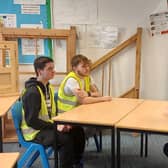 Aylesbury MP Rob Butler chats with carpentry apprentices at Buckinghamshire College’s Aylesbury campus