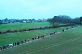 More than 100 people gathered for the protest walk