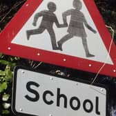 Drivers stopping on school 'keep clears' is one example of a moving traffic offence