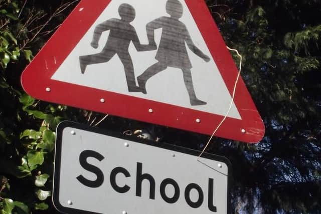 Drivers stopping on school 'keep clears' is one example of a moving traffic offence