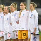 Aylesbury's Ellen White (on right) lines up with the England women's football team for the national anthems at their game against Spain earlier in the week   (Picture Harriet Lander / Getty Images)