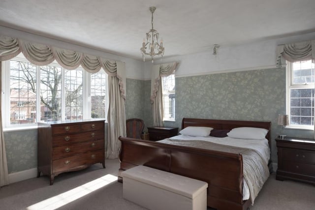 The main bedroom measures 15ft 11in by 14ft 11in and boasts an en suite