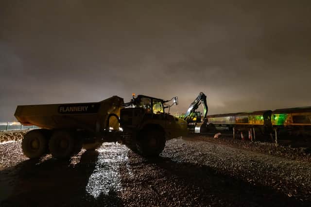 The railhead delivering materials at night in the off-peak hours, off the roads to the site for use in building the line of route near Aylesbury
