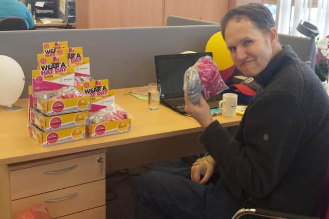 Andrew in the offices of Brain Tumour Research in 2015