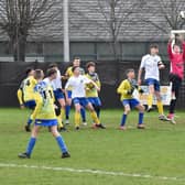 Bobby Swain makes a save the Under 14s cup final