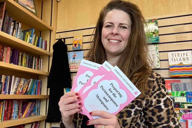 University Bookshop owner Alison Cameron with a recently published book on the menopause, one of the titles which will be on sale at the event