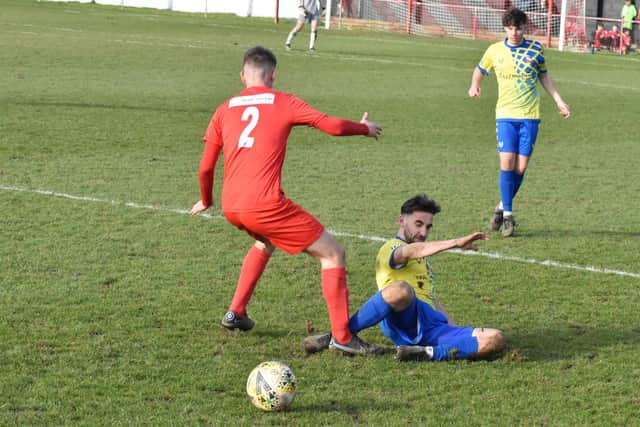 Captain Dave Brown wins a challenge for Aylesbury Vale Dynamos against Flackwell Heath