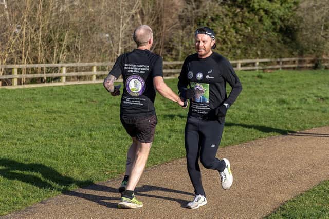 Pete Reynolds at the Buckingham parkrun, guided by Robby Taylor