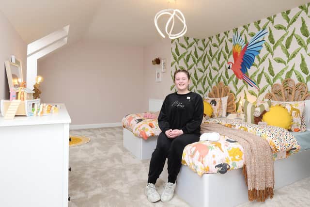 Amber in the jungle-inspired bedroom she designed at St Rumbold's Fields