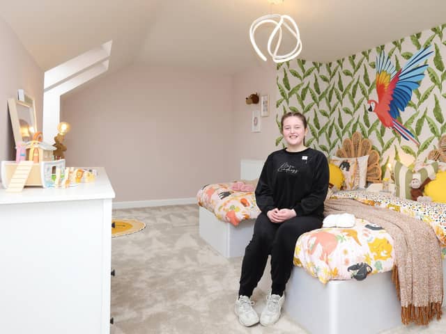 Amber in the jungle-inspired bedroom she designed at St Rumbold's Fields