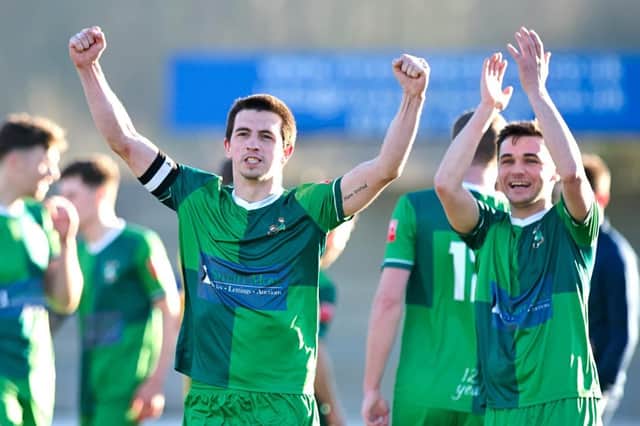 Captain Jack Wood celebrating at Aylesbury United's win over Hertford Town