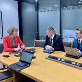 Rail Minister Wendy Morton with Steve Broadbent, second left, and Greg Smith, right