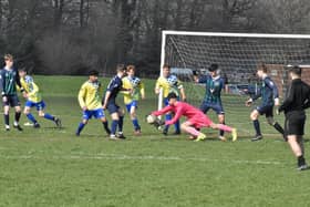 Jonathan Zimmerman makes a save for Dynamos U16s