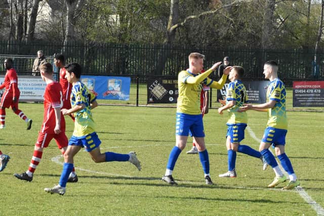 Ollie Lawford (right) celebrates his first penalty with Jake Baldwin on the way to victory for Aylesbury Vale Dynamos