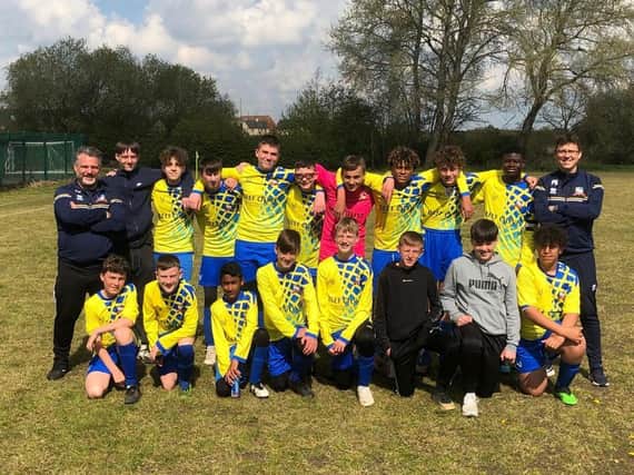 Aylesbury Vale Dynamos Colts Under 14s, managed by Andy Collins, after their win which puts them top of the table