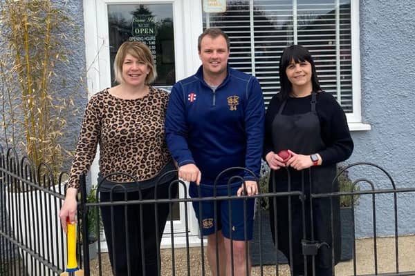 Marsh Gibbon Cricket Clubs vice-captain Joe Leonard, with Debbie Fenton and Dawn Green of new sponsors Affinity Hair Design