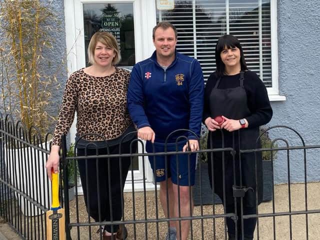 Marsh Gibbon Cricket Clubs vice-captain Joe Leonard, with Debbie Fenton and Dawn Green of new sponsors Affinity Hair Design