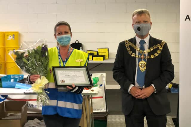 Mayor of Aylesbury awards Vicki Parker at Stoke Mandeville Stadium vaccination centre