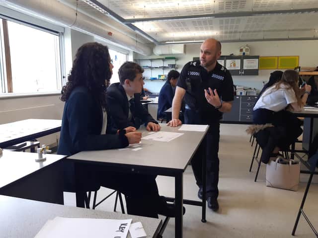 Sgt Russ Massie and pupils