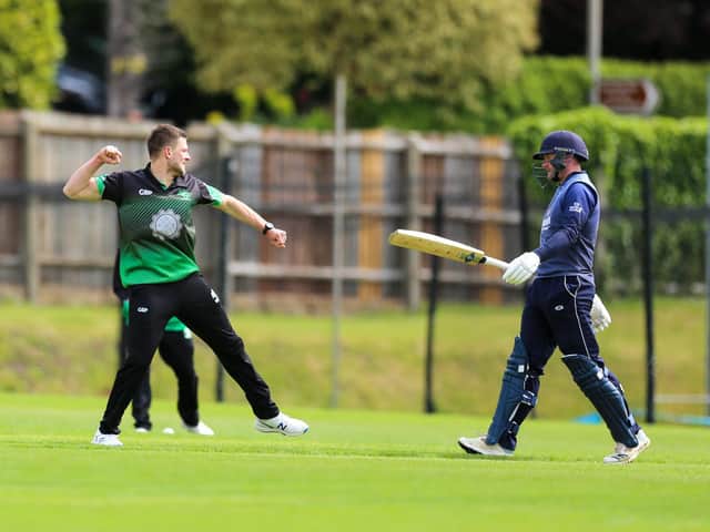Bucks captain Tom Hampton celebrates after trapping Oxon opener Harry Smith lbw at High Wycombe on Sunday