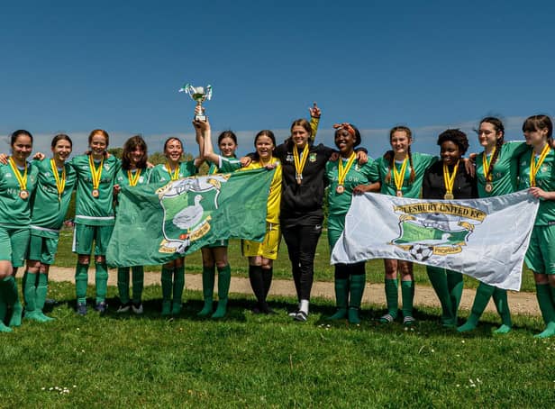 Aylesbury United Girls Under 14s Greens celebrate with their medals and  Division 2 trophy