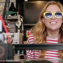 BBC presenter Maddie Moate trying on her Print World glasses in Aylesbury