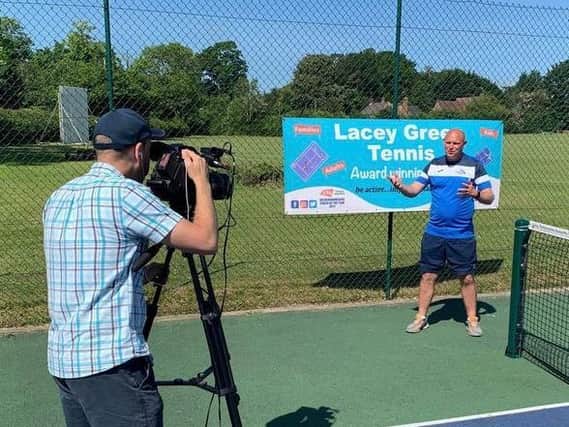 Head coach Dan Smith is interviewed by the LTA