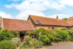 This five bedroom detached barn conversion in Gubblecote is on the market right now