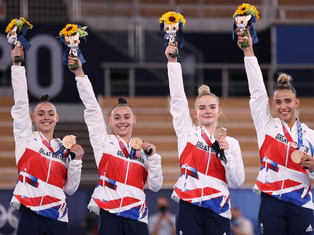 Great Britain’s team bronze medallists Jennifer and Jessica Gadirova with Alice Kinsella and Amelie Morgan on the podium in Tokyo    (Picture by Laurence Griffiths / Getty Images)
