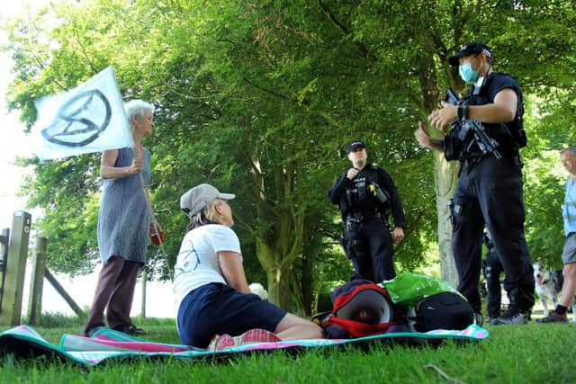 Police officers and protesters