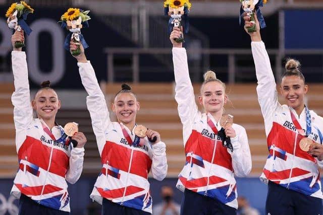 Great Britain’s team bronze medallists Jennifer and Jessica Gadirova with Alice Kinsella and Amelie Morgan on the podium in Tokyo (Picture by Laurence Griffiths / Getty Images)