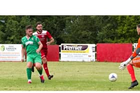 Harry Jones scoring for Aylesbury United against Risborough Rangers in their friendly last weekend (Pictures by Mike Snell)