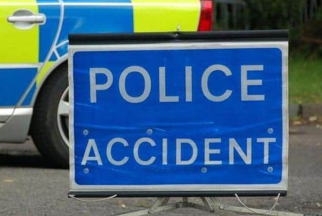Police are investigating the collision which saw a motorcyclist in his 40s die