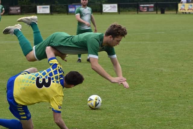 AVD's Dan Wilson with a tackle against Leverstock Green