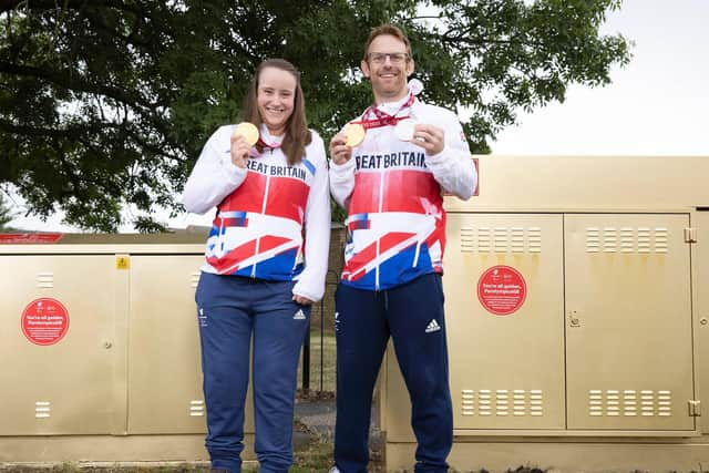 Phoebe Paterson Pine and Jody Cundy OBE with medals at Virgin Media's gold cabinets (C) Matt Alexander at Press Association