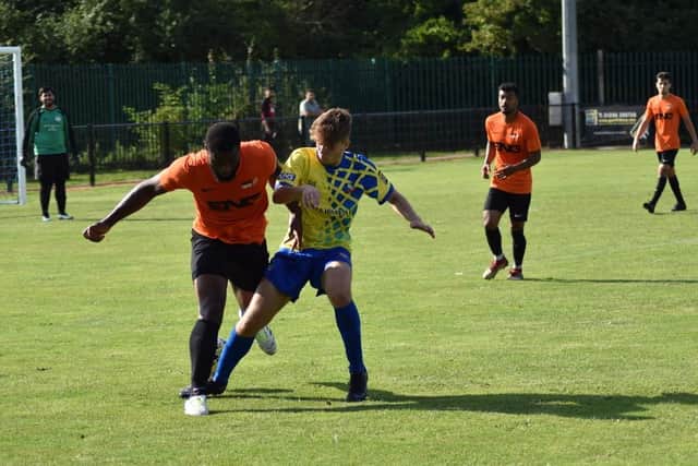 Alfi Touceda challenges for the ball for AVD against London Tigers in the FA Vase