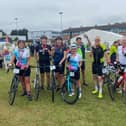 Members of the 70km team from Winslow Wheelers proudly show off their medals at the Tour de Vale on Sunday