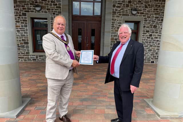 Councillor David Marren presented a certificate to Alan Jose, Westerleigh Group Ambassador