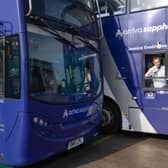 Jennifer and Jessica on their very own buses