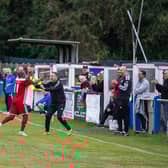 Risborough Rangers' Sam Pekun, scorer of their second goal, celebrating with Manager Mark Eaton (Picture by Charlie Carter)
