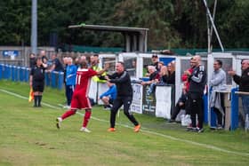 Risborough Rangers' Sam Pekun, scorer of their second goal, celebrating with Manager Mark Eaton (Picture by Charlie Carter)