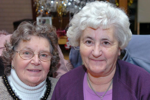 Gisele and Ailish captured at the members of  Cookstown 040 Christmas dinner in 2010.