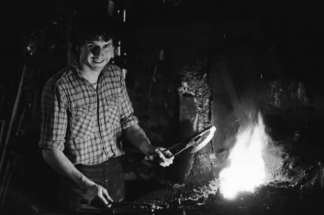 23-years-old blacksmith and farrier John McDaid at work at his forge in Moville.