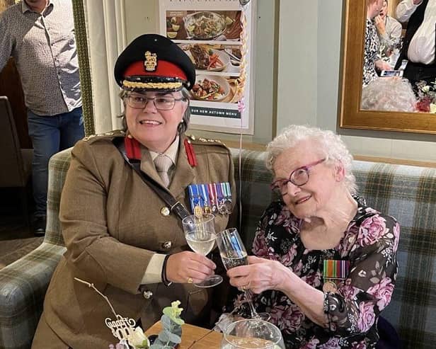 Margaret Wilkins celebrates her hundredth birthday with Colonel Leona Barr-Jones